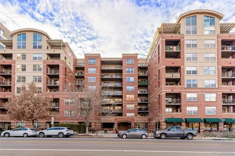 a front view of a building with a street