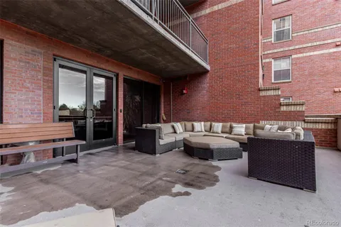 a view of patio with outdoor seating