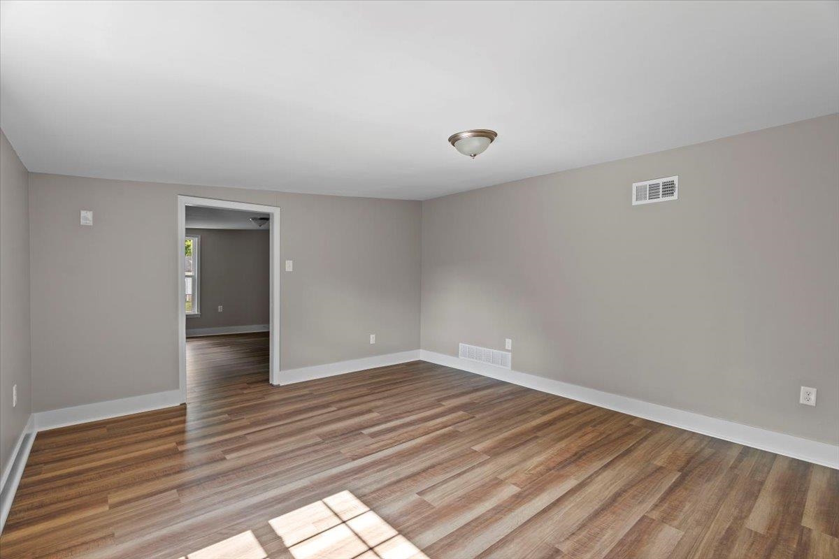 101 Sivil Circle Covington, TN 38019 - Photo 13 of 40 wooden floor in an empty room