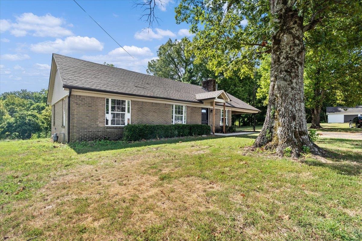 101 Sivil Circle Covington, TN 38019 - Photo 26 of 40 a house view with a garden space