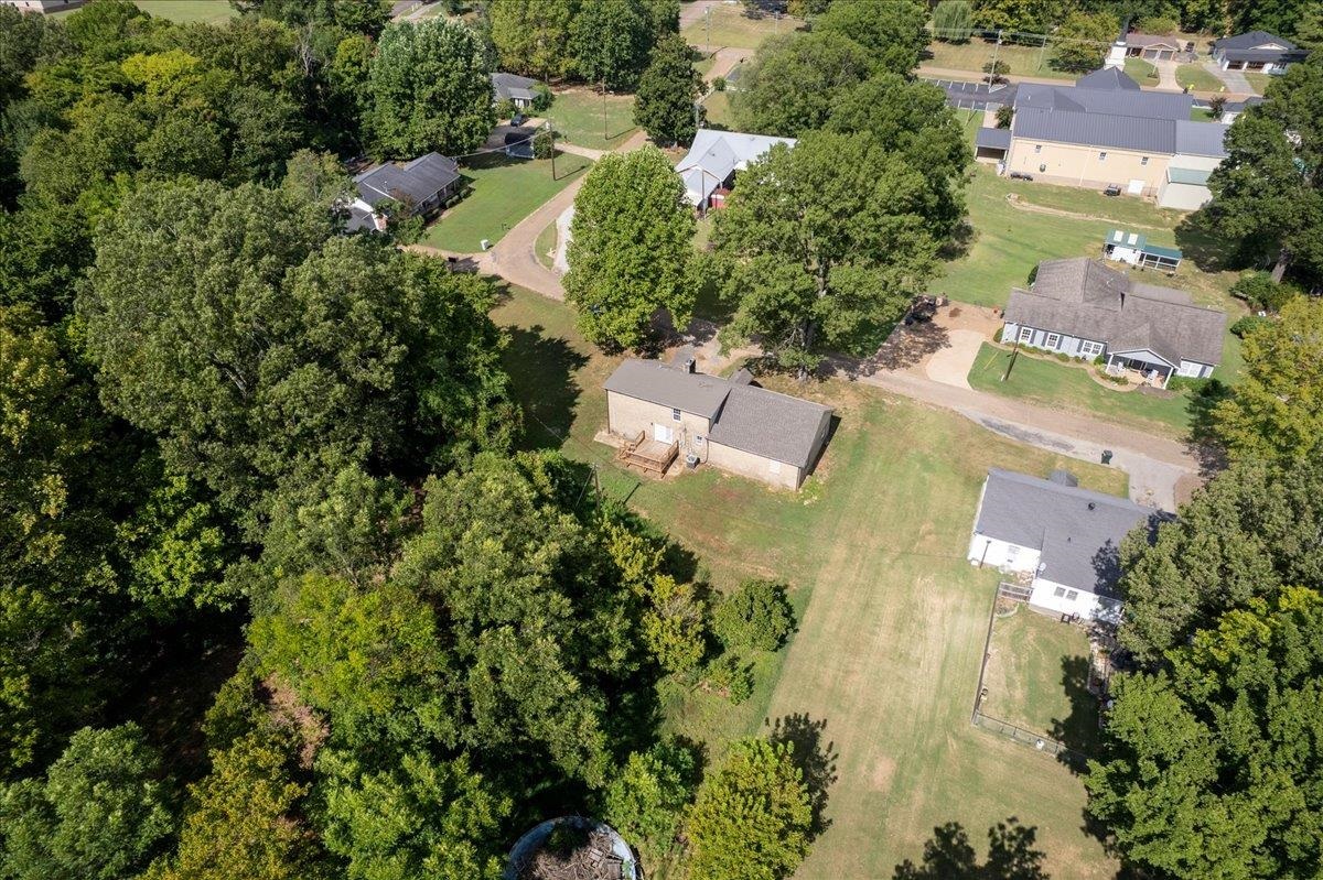 101 Sivil Circle Covington, TN 38019 - Photo 28 of 40 an aerial view of residential house with outdoor space and trees all around