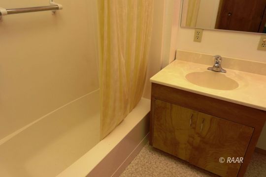 237 North Alford Street Ridgecrest, CA 93555 - Photo 25 of 35 a bathroom with a sink and a mirror