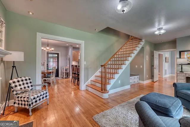 a kitchen with stainless steel appliances granite countertop a sink and a stove