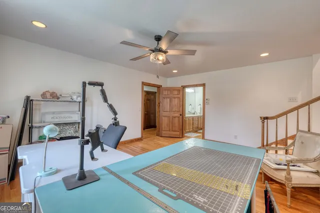 a bathroom with a tub and a window