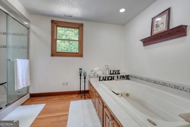 a bedroom with a workspace