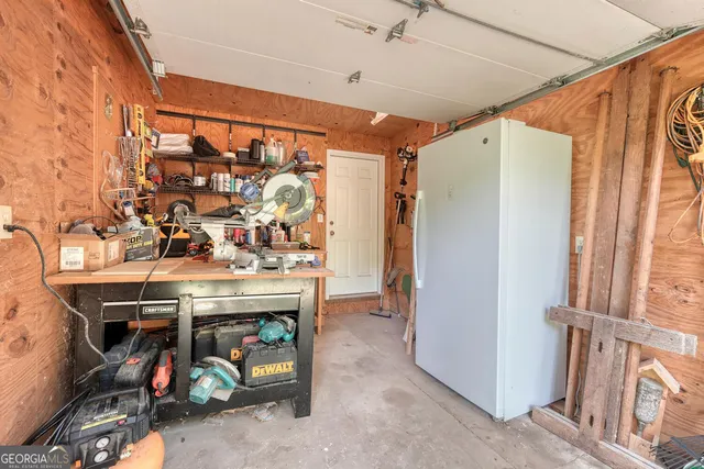 a view of outdoor space with trees all around