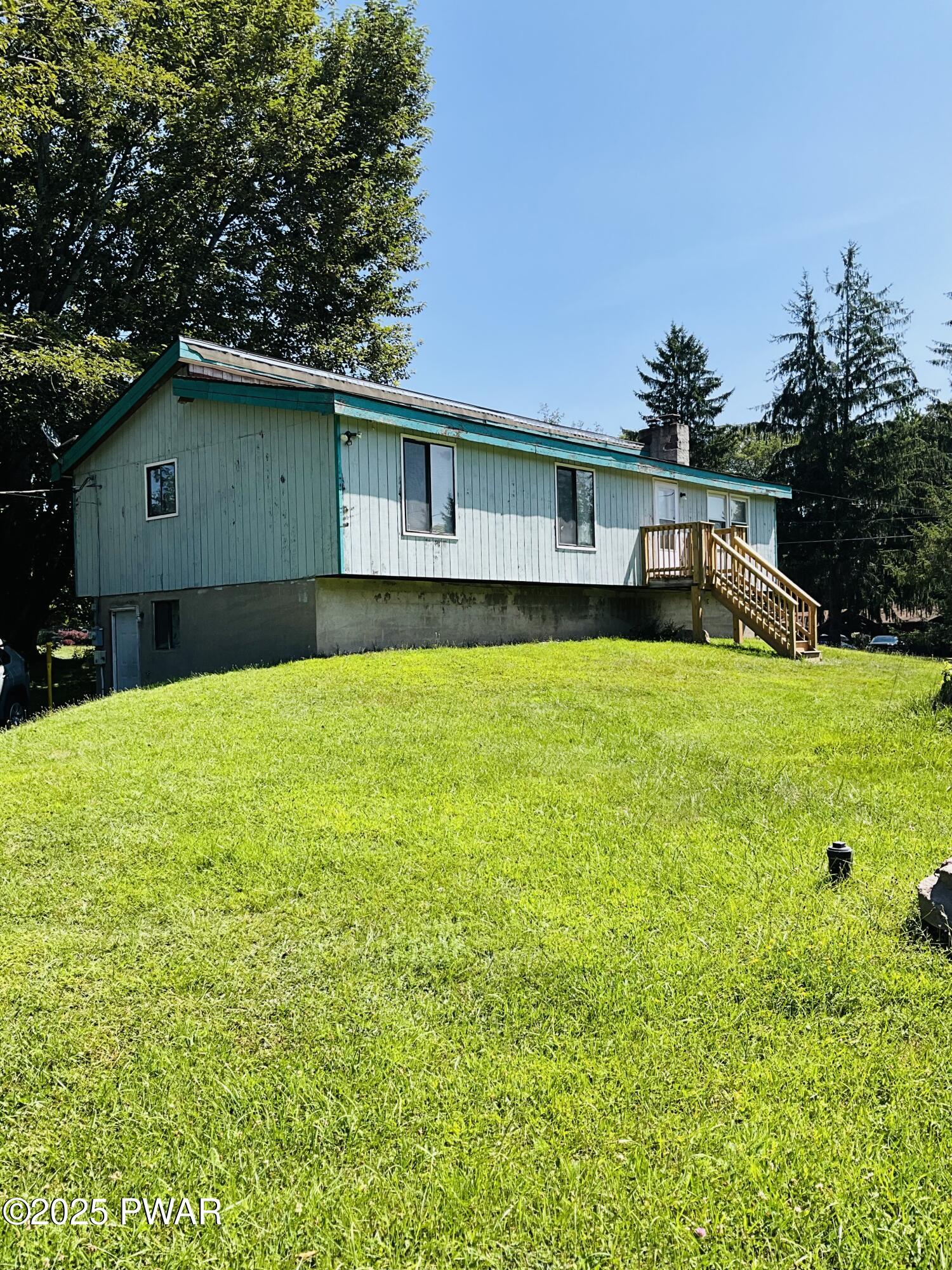 30 Brookfield Road, Unit LOT 1259 Lake Ariel, PA 18436 - Photo 3 of 32 a view of a house with a yard
