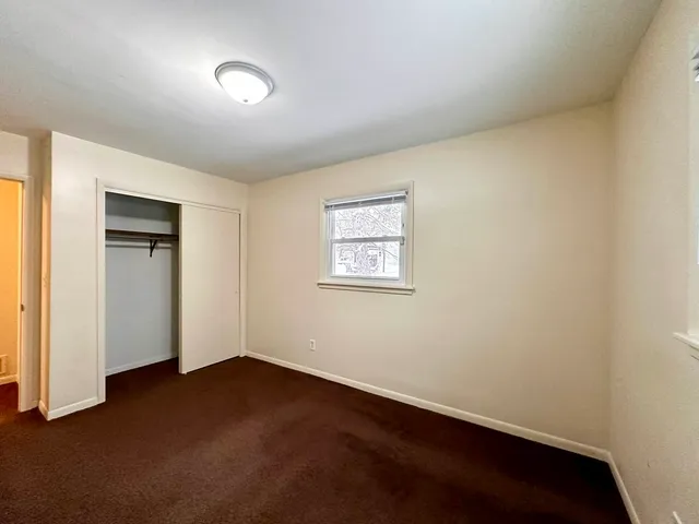 an empty room with a workspace