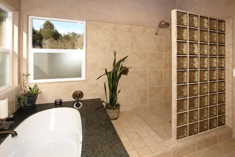 5 Nunes Road Watsonville, CA 95076 - Photo 18 of 41 a bathroom with a tub sink and window
