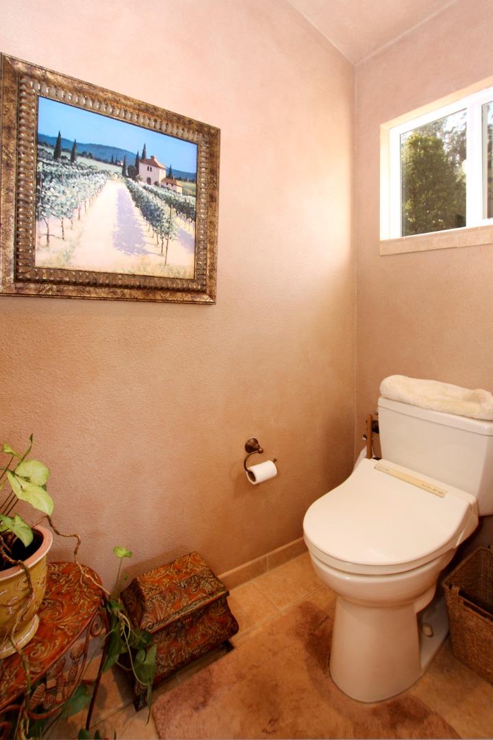 5 Nunes Road Watsonville, CA 95076 - Photo 20 of 41 a bathroom with a toilet and a shower