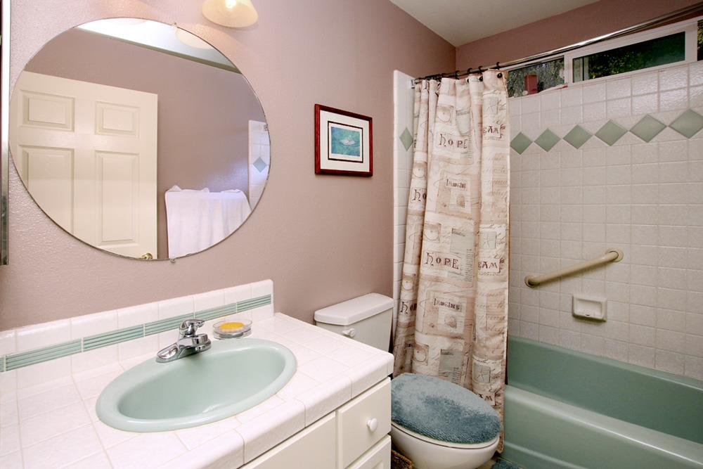 5 Nunes Road Watsonville, CA 95076 - Photo 24 of 41 a bathroom with a sink toilet and shower