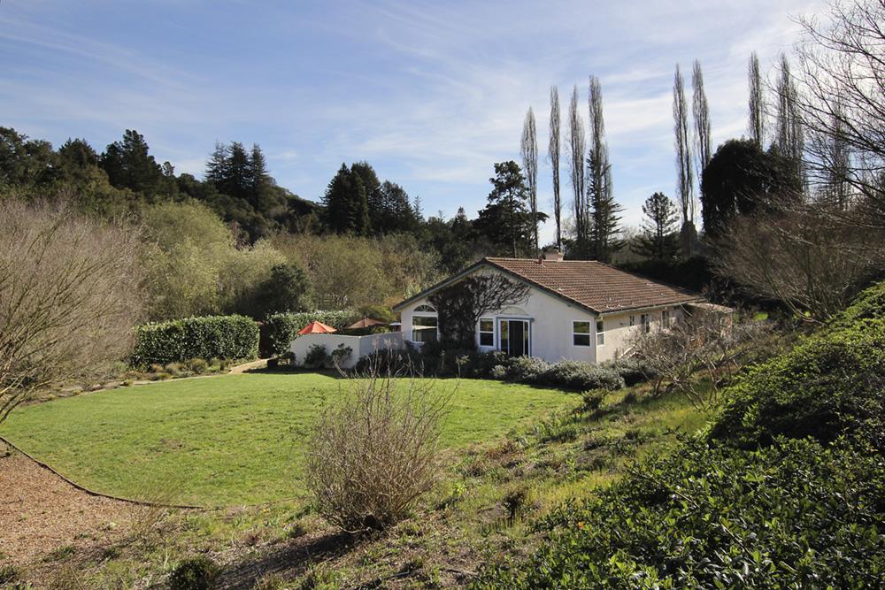 5 Nunes Road Watsonville, CA 95076 - Photo 33 of 41 a view of a house with a yard and a fountain