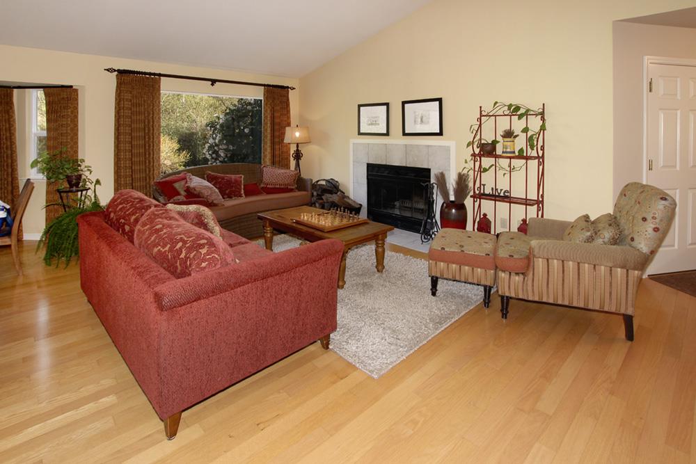 5 Nunes Road Watsonville, CA 95076 - Photo 7 of 41 a living room with furniture and a fireplace