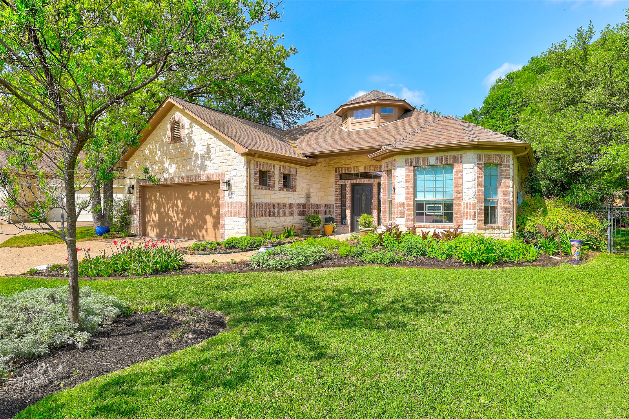 805 Boquilla Trail Georgetown, TX 78633 - Photo 2 of 40 a front view of a house with a yard