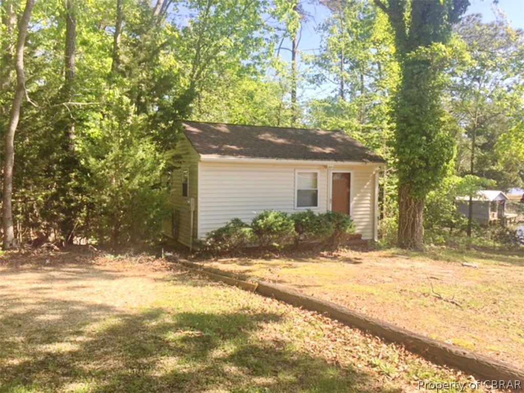 276 Pond Road Lancaster, VA 22503 - Photo 14 of 16 Guest cottage with one bedroom, one bath and small utility room.