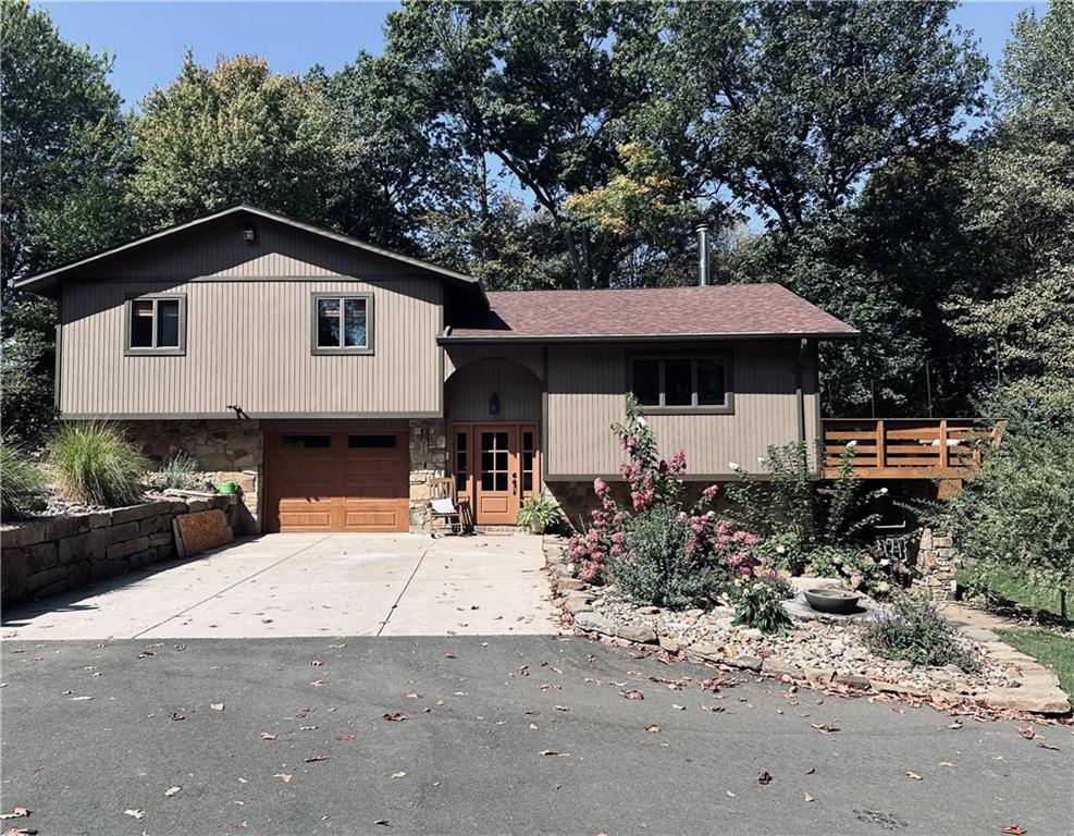139 Hardin Run Road Georgetown, PA 15043 - Photo 1 of 50 a front view of a house with garden