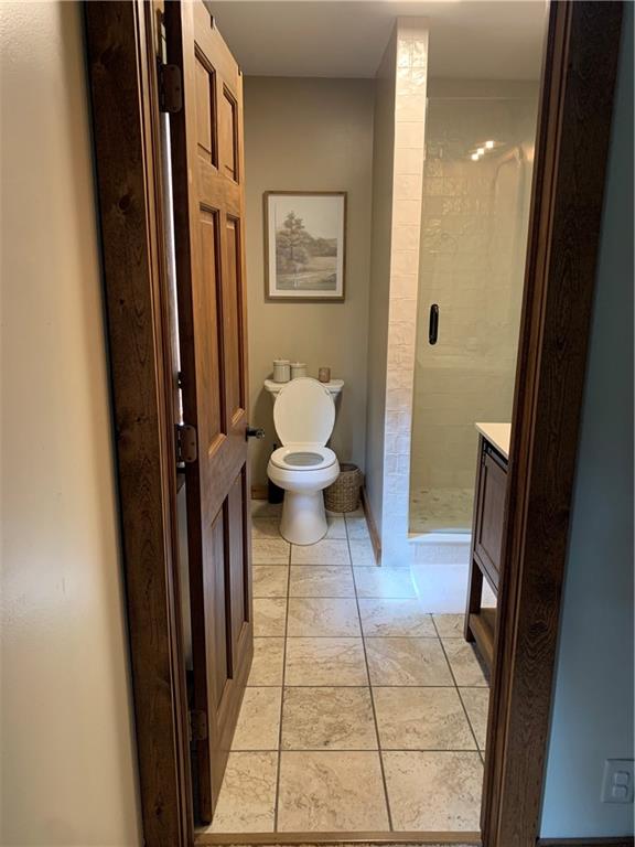139 Hardin Run Road Georgetown, PA 15043 - Photo 15 of 50 a bathroom with a toilet and a mirror