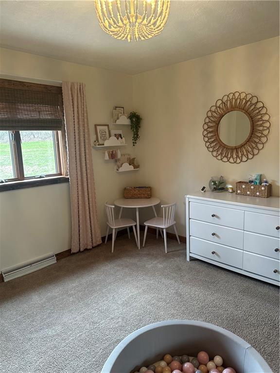 139 Hardin Run Road Georgetown, PA 15043 - Photo 21 of 50 a room with a baby crib and a dresser