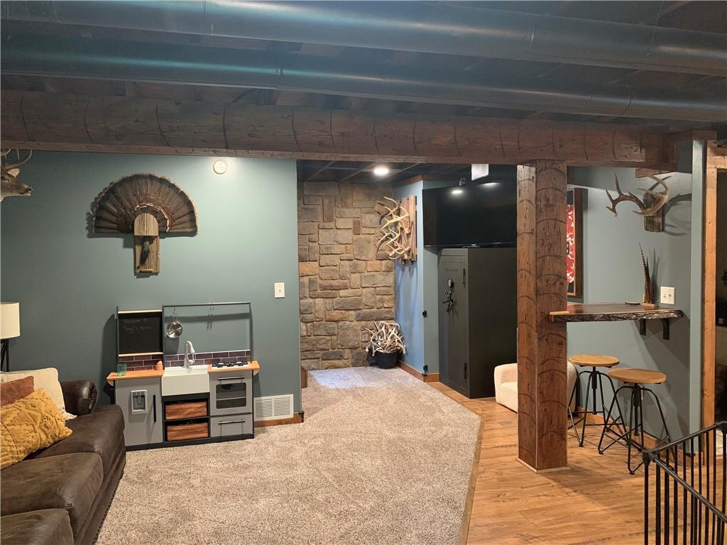 139 Hardin Run Road Georgetown, PA 15043 - Photo 31 of 50 a living room with furniture and a fireplace