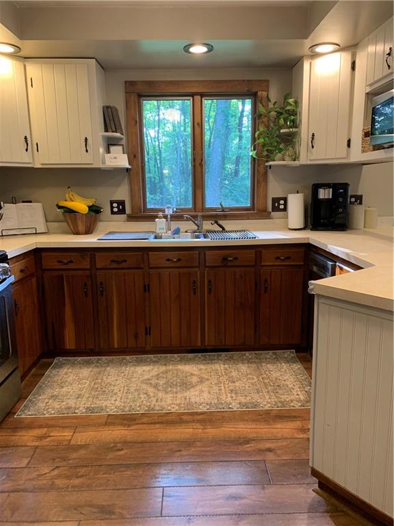 139 Hardin Run Road Georgetown, PA 15043 - Photo 4 of 50 a kitchen with stainless steel appliances granite countertop a stove a sink and a microwave