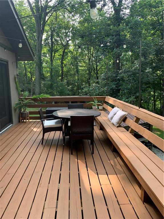 139 Hardin Run Road Georgetown, PA 15043 - Photo 43 of 50 a balcony with wooden floor and outdoor seating