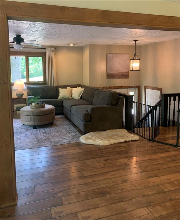 139 Hardin Run Road Georgetown, PA 15043 - Photo 7 of 50 a living room with furniture and a fireplace