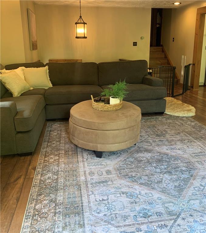 139 Hardin Run Road Georgetown, PA 15043 - Photo 8 of 50 a living room with a couch and a fireplace