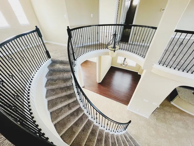 wooden floor with staircase
