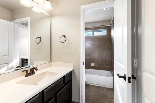 a view of a room with dryer and door