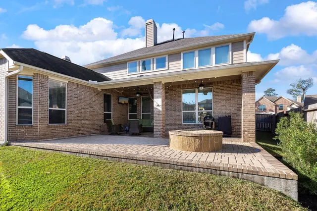 a view of swimming pool with a yard