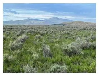 a view of an outdoor space with a lake view