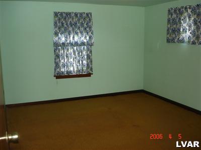 353 West Street Bath, PA 18014 - Photo 7 of 9 an empty room with a window