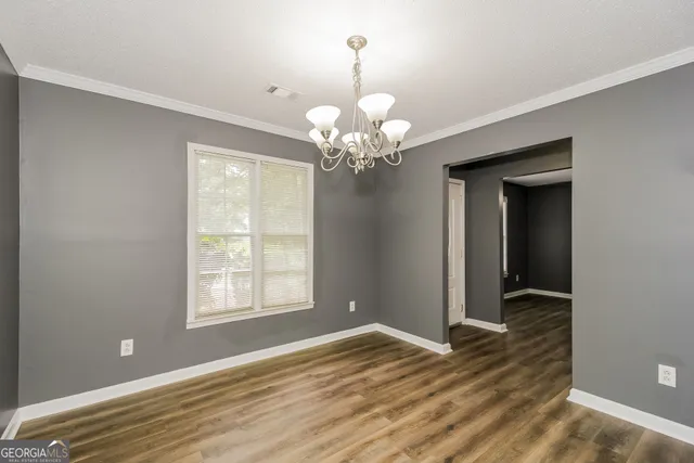 a view of a livingroom with a chandelier