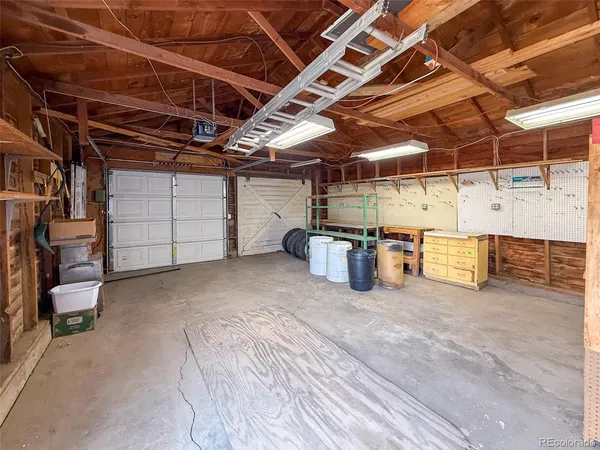a view of a garage with storage