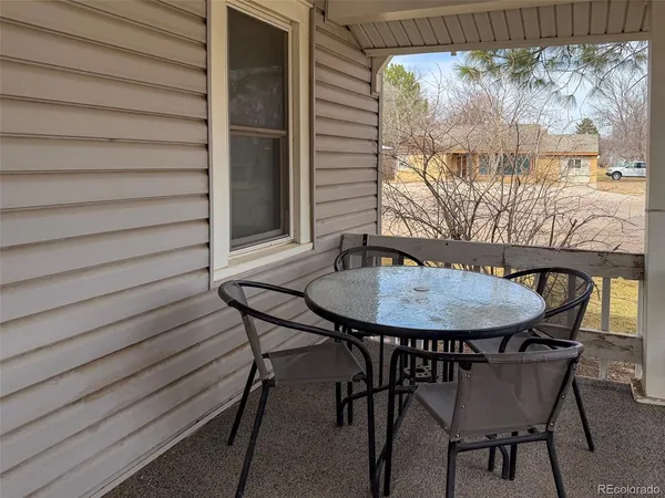 a view of a outdoor seating area with furniture