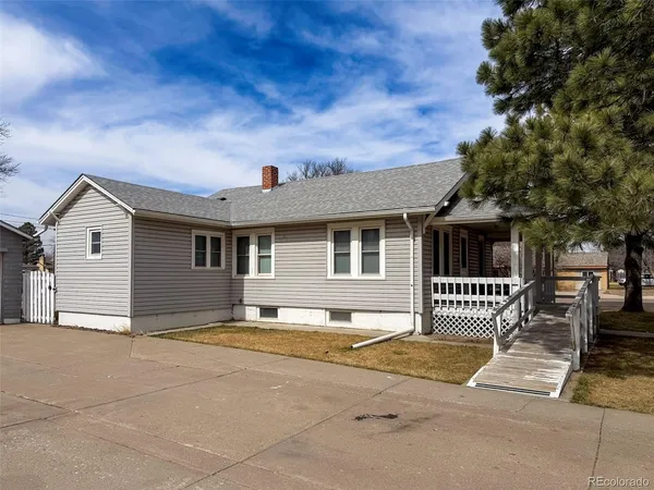 a front view of a house with a garage
