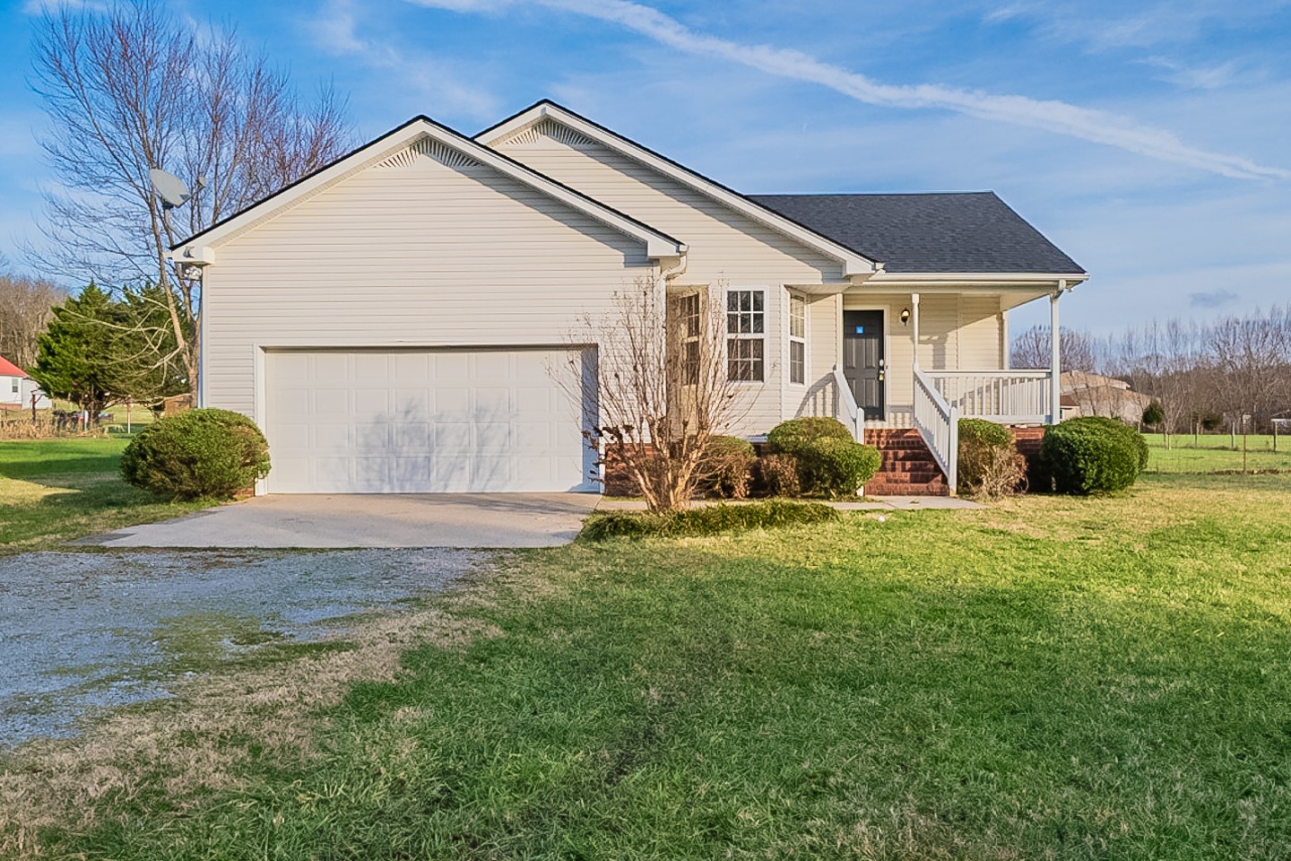 85 Blue Well Road Lebanon, TN 37090 - Photo 1 of 27 a front view of a house with garden