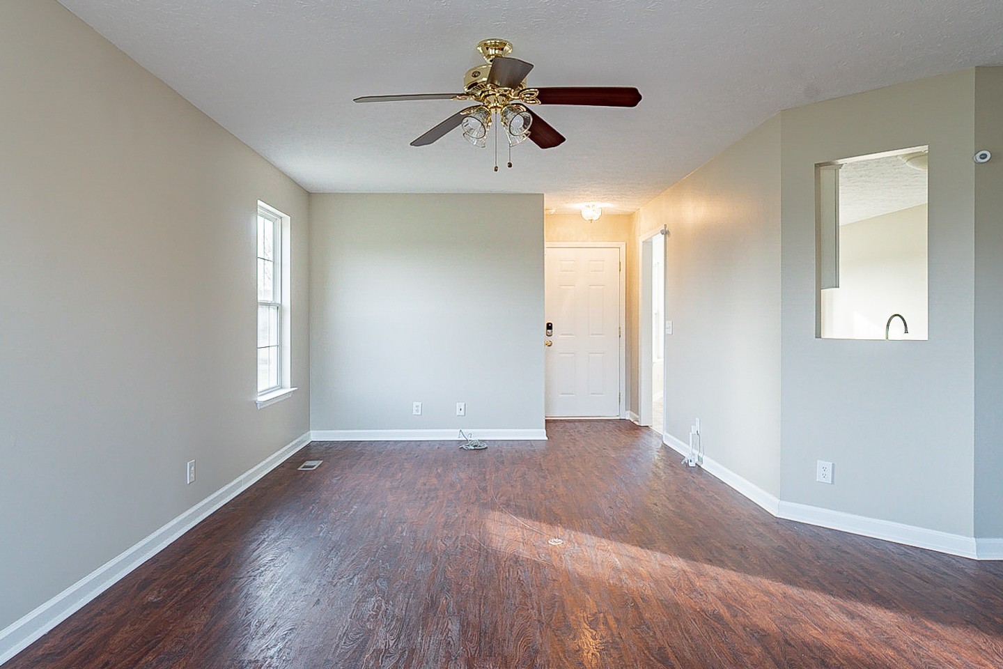 85 Blue Well Road Lebanon, TN 37090 - Photo 12 of 27 a view of an empty room with window and wooden floor