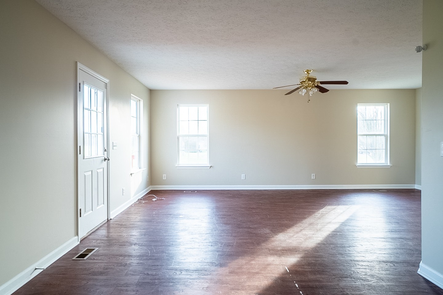85 Blue Well Road Lebanon, TN 37090 - Photo 5 of 27 wooden floor in an empty room with a window