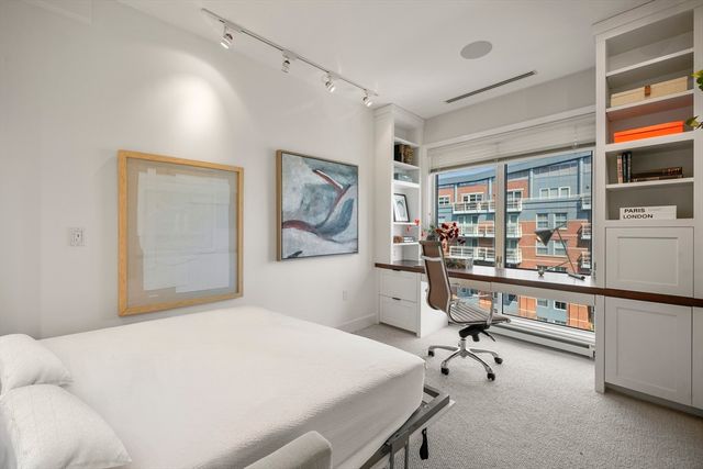 a bed room with a bed and furniture