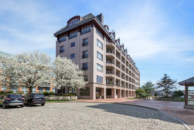 a view of a building with a street