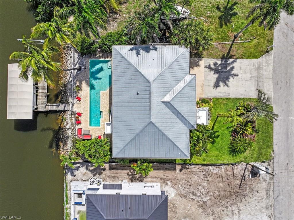 4838 Gary Road Bonita Springs, FL 34134 - Photo 2 of 29 an aerial view of a house with garden space and street view