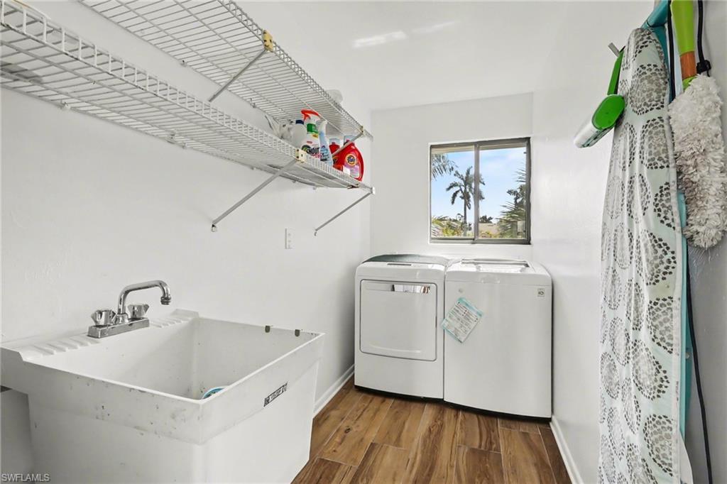 4838 Gary Road Bonita Springs, FL 34134 - Photo 23 of 29 a utility room with a window dryer and washer