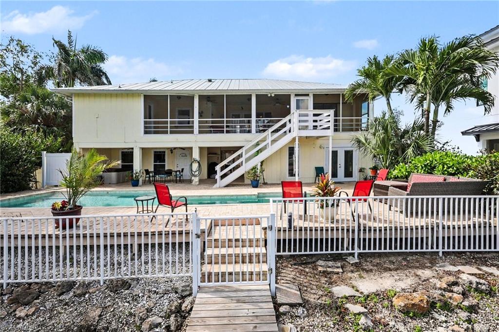 4838 Gary Road Bonita Springs, FL 34134 - Photo 28 of 29 a view of a house with a patio