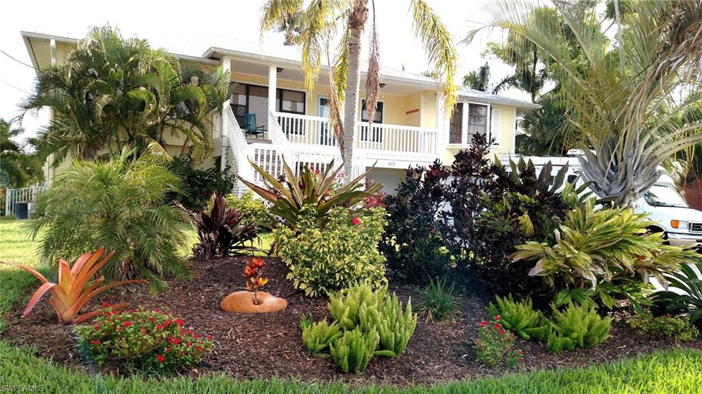 4838 Gary Road Bonita Springs, FL 34134 - Photo 3 of 29 a view of a garden with plants