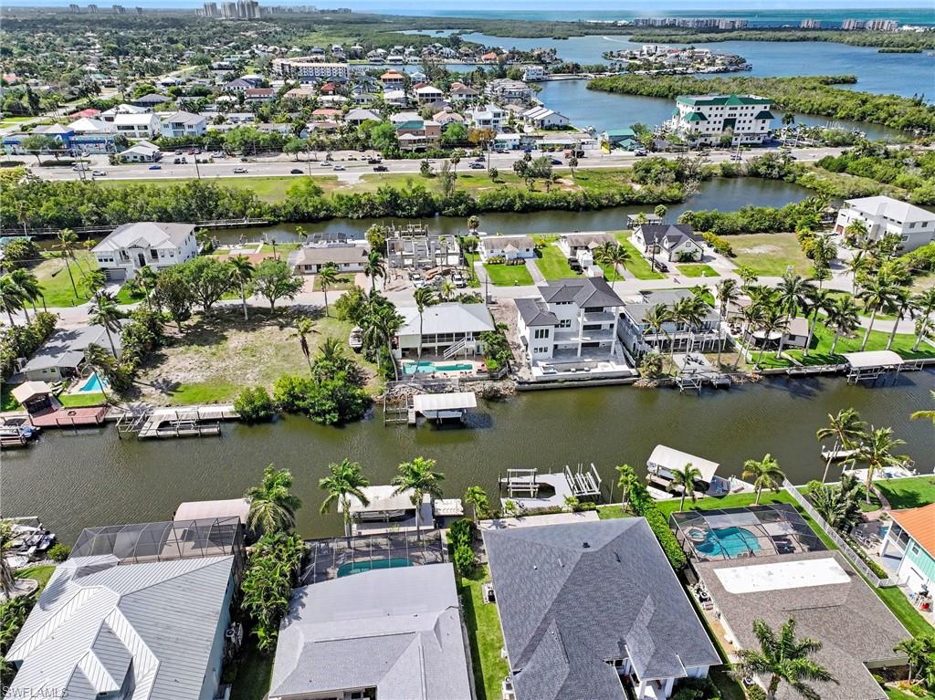 4838 Gary Road Bonita Springs, FL 34134 - Photo 7 of 29 an aerial view of residential houses with outdoor space and lake view
