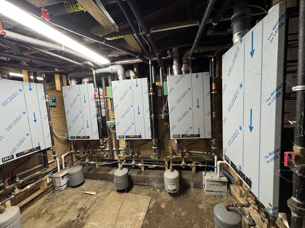 28 Grand Street Lowell, MA 01851 - Photo 16 of 23 a view of swimming pool with outdoor seating