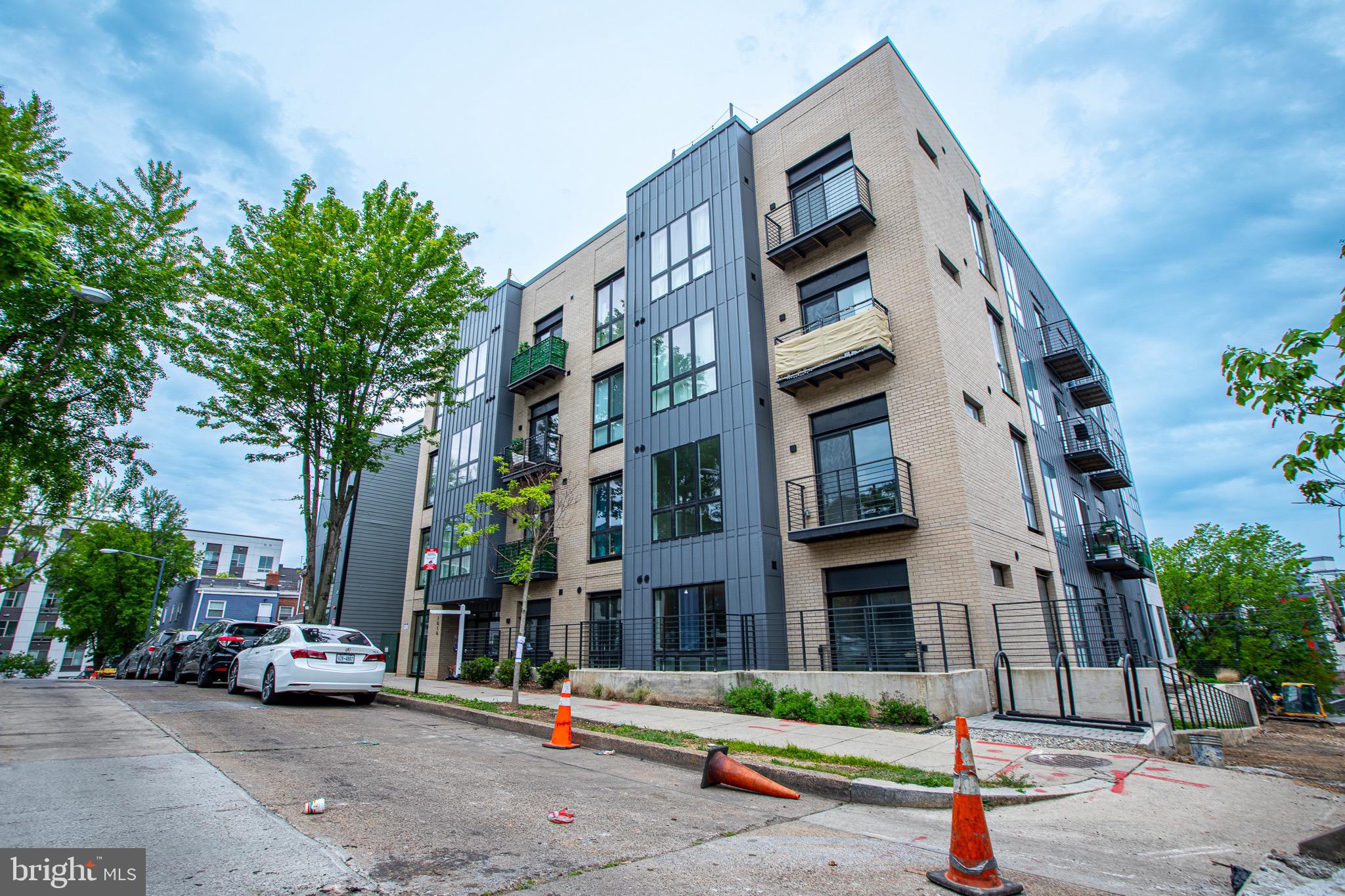 1016 17th Place Northeast, Unit 8 Washington, DC 20002 - Photo 2 of 21 a view of a street with cars