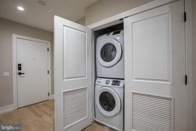 a utility room with dryer and washer