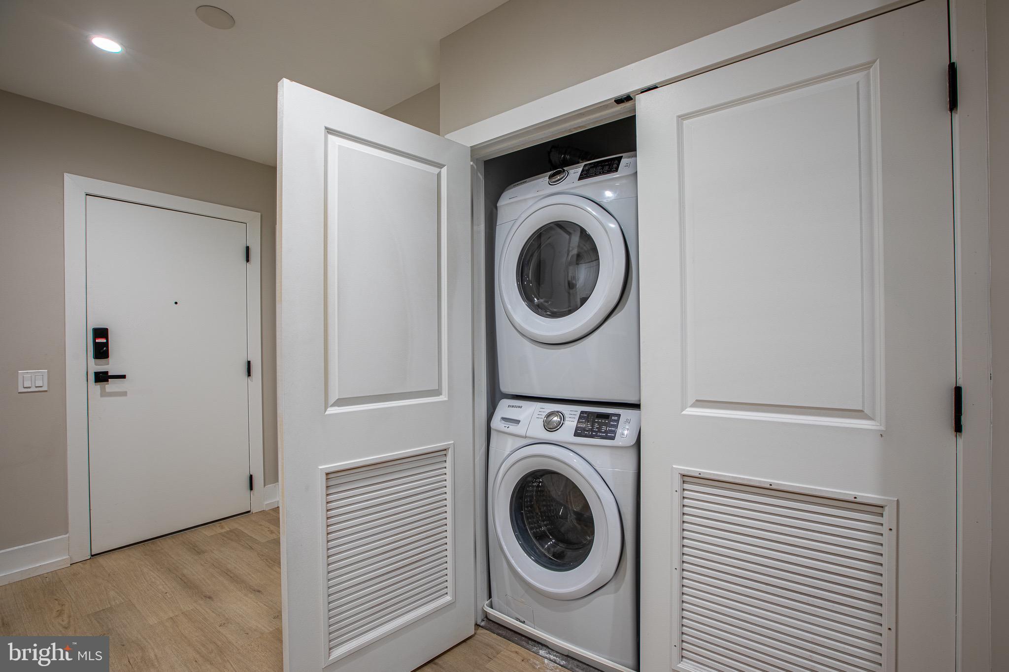 1016 17th Place Northeast, Unit 8 Washington, DC 20002 - Photo 21 of 21 a utility room with dryer and washer